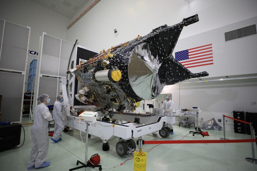 A team prepares NASA’s Psyche spacecraft for launch inside the Astrotech Space Operations Facility near the agency’s Kennedy Space Center in Florida on Dec. 8, 2022. Psyche will launch atop a SpaceX Falcon Heavy rocket from Launch Complex 39A at Kennedy. 