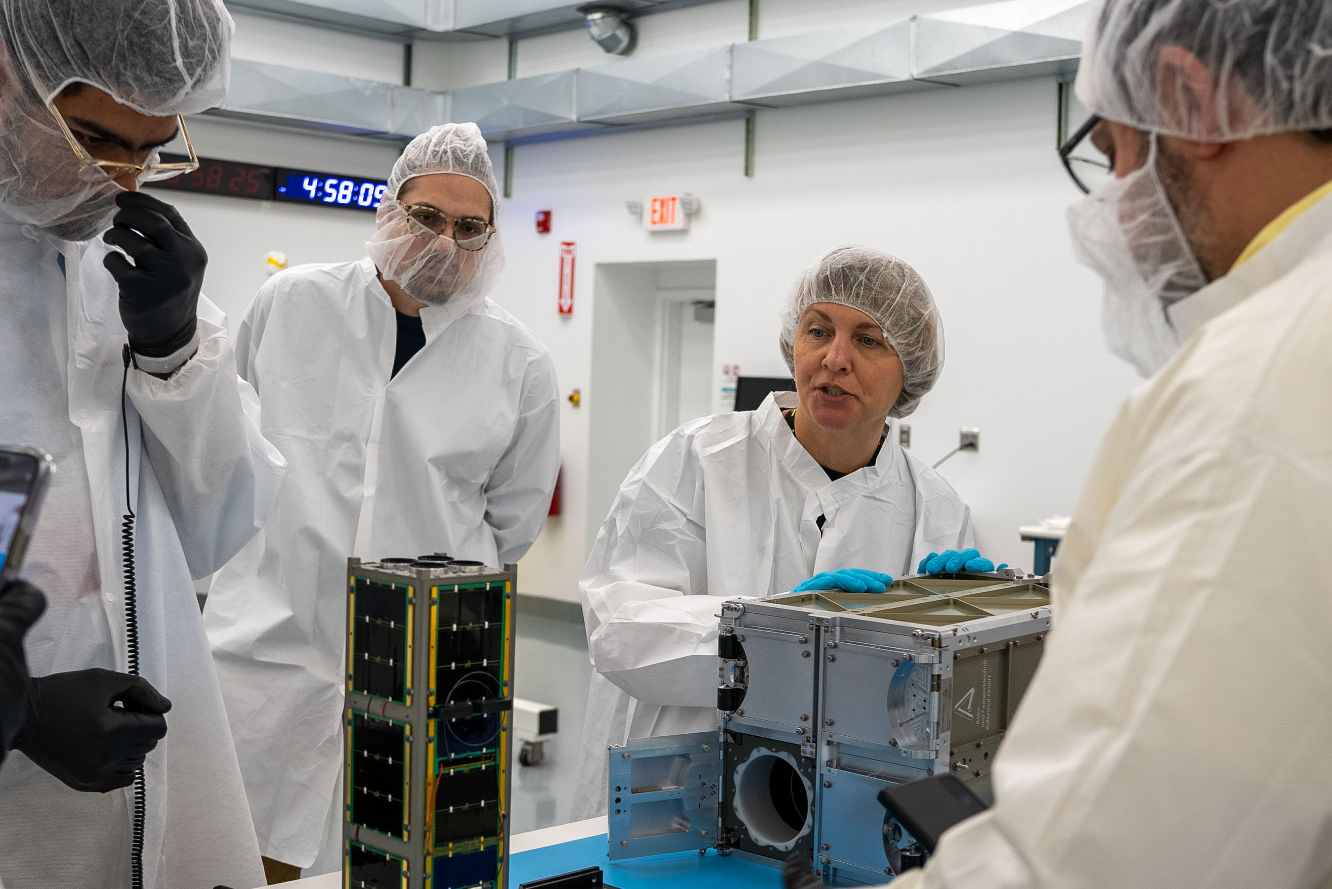 Image of Technicians from the University of Maine prepare CubeSat MESAT-1 for integration at Firefly’s Payload Processing Facility at Vandenberg Space Force Base, California on Monday, April 22, 2024. MESAT-1, along with seven other payloads, will be integrated into a Firefly Aerospace Alpha rocket for NASA’s Educational Launch of Nanosatellites (ELaNa) 43 mission as part of the agency’s CubeSat Launch Initiative and Firefly’s Venture-Class Launch Services Demonstration 2 contract.