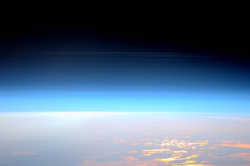 Noctilucent or "night shining" clouds forming in the mesosphere as seen from the International Space Station