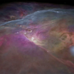 A 3D model of the Orion Nebula shows Orion’s Veil shell as a bluish gas surrounding the nebula depicted in red and yellow