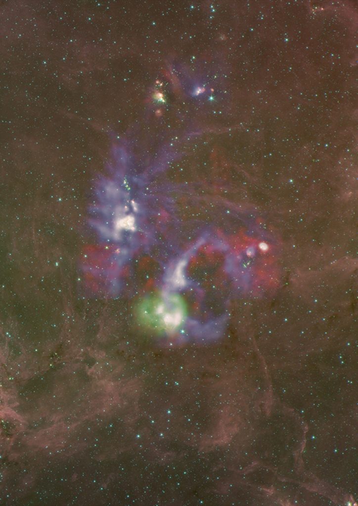 Composite image of Cygnus X obtained by NASA’s Spitzer Space Telescope, with SOFIA’s upGREAT ionized carbon data overlaid in blue, green, and red