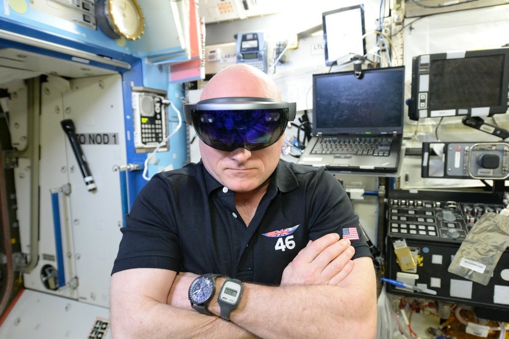 NASA astronaut Scott Kelly performing checkouts for NASA's Project Sidekick, which makes use of Microsoft's HoloLens device. 