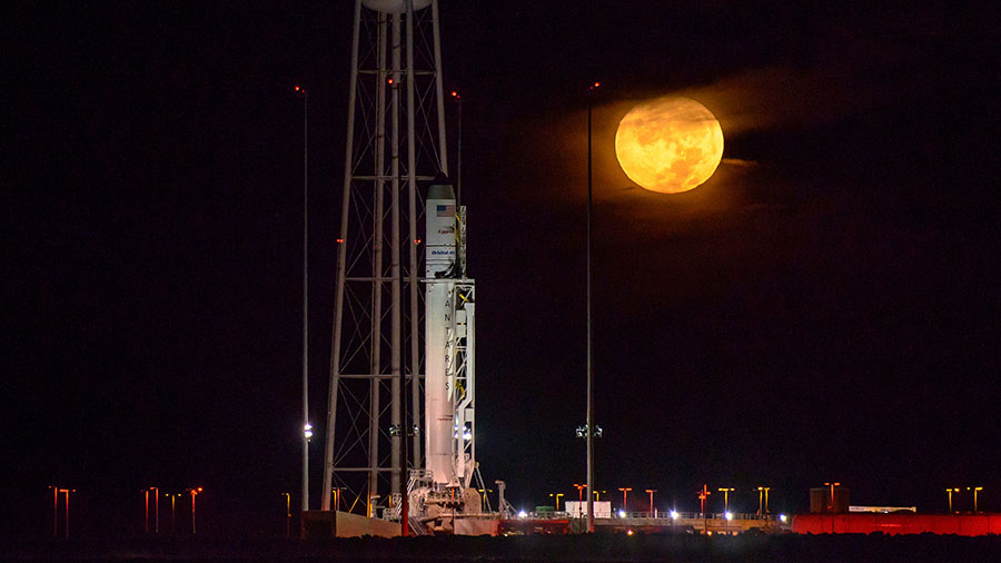 Full Moon Sets Over Antares Rocket