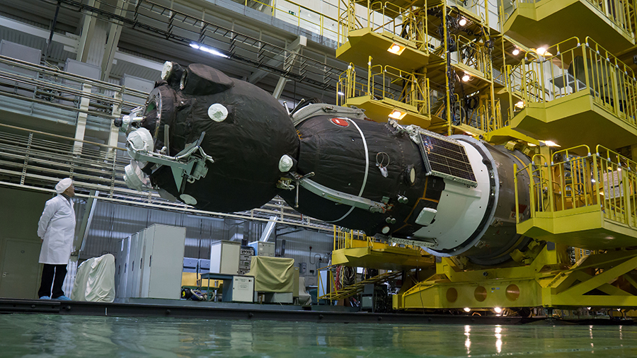 The Soyuz MS-08 spacecraft is rotated to a horizontal position