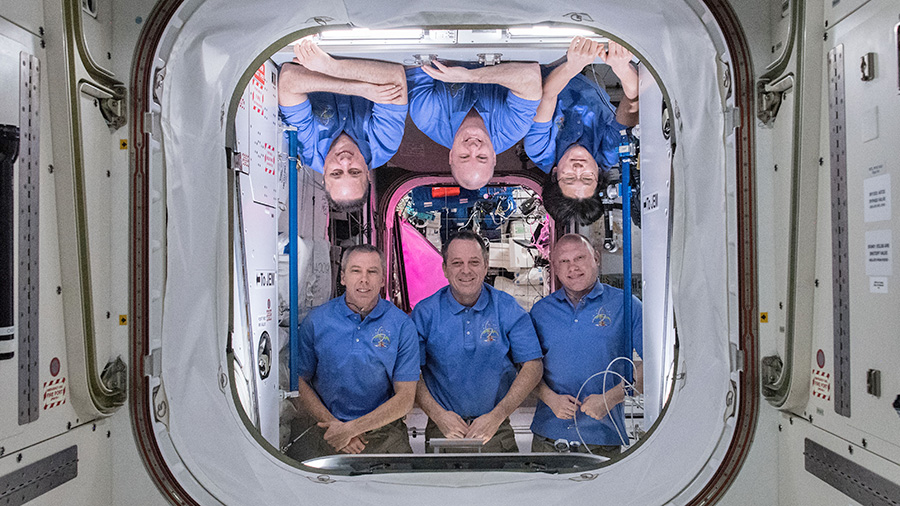 The six-member Expedition 55 crew poses inside the Harmony module