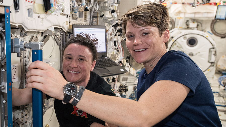 NASA astronauts Serena Auñón-Chancellor (background) and Anne McClain