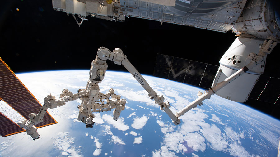 The Canadarm2 robotic arm with its robotic hand also known as Dextre