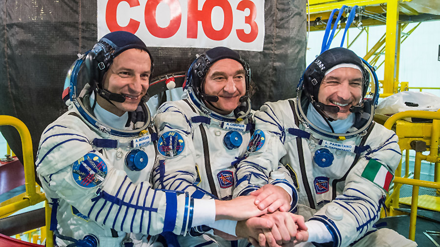 New Expedition 60 crewmembers (from left) Drew Morgan, Alexander Skvortsov and Luca Parmitano