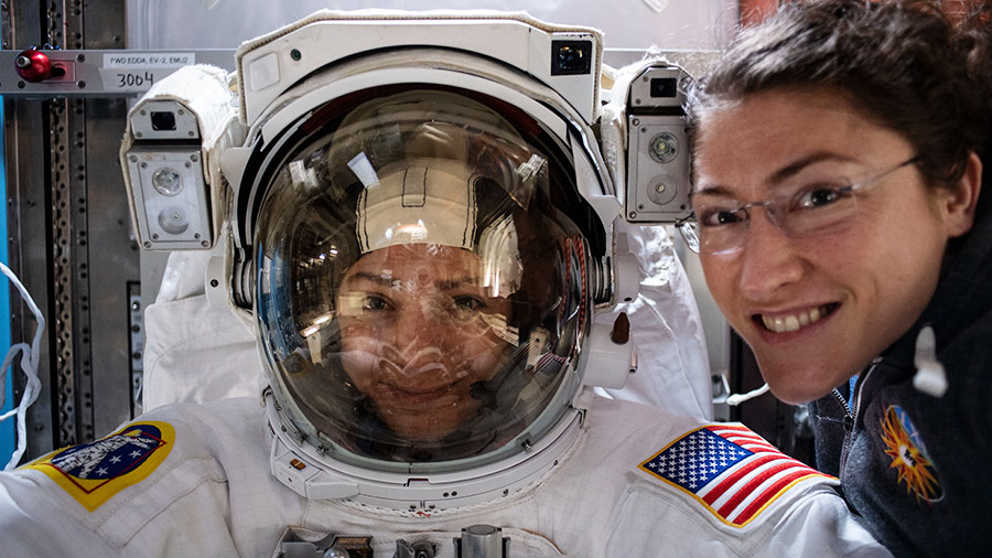 NASA astronauts Christina Koch and Jessica Meir prepare for a spacewalk