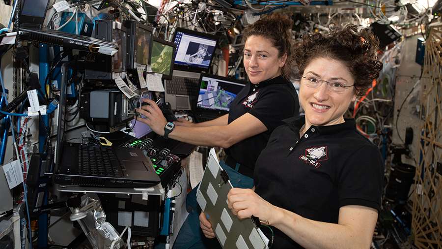 NASA astronauts (from left ) Jessica Meir and Christina Koch