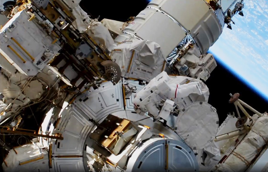 NASA astronaut Jessica Meir enters the Quest airlock 