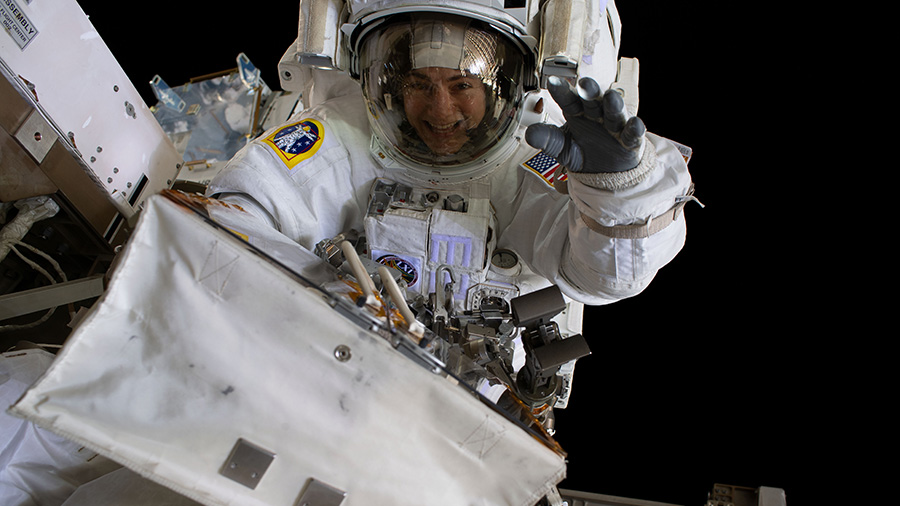 Astronaut Jessica Meir waves during a spacewalk