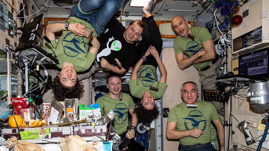 The Expedition 61 crew gathered together for a New Year's Eve meal