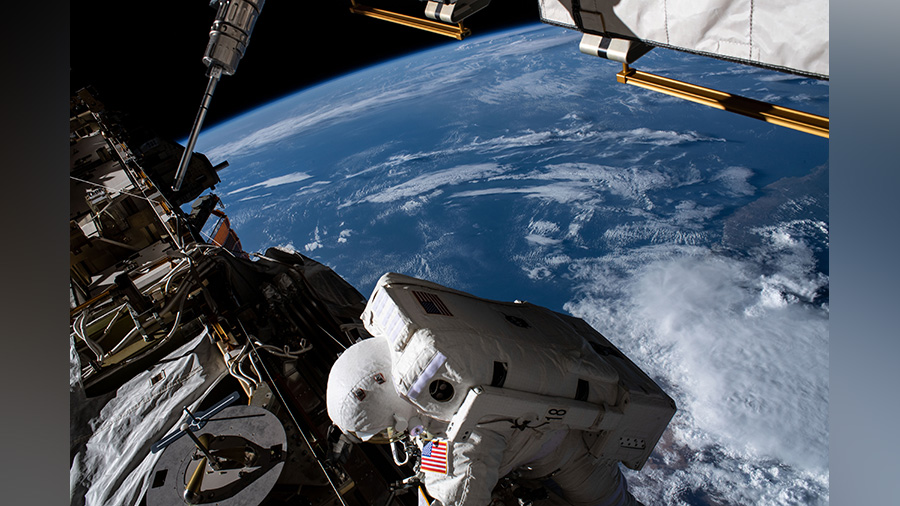 NASA astronaut Christina Koch is pictured working in the vacuum of space