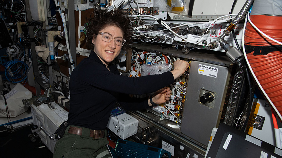 NASA astronaut Christina Koch works on the Cold Atom Lab