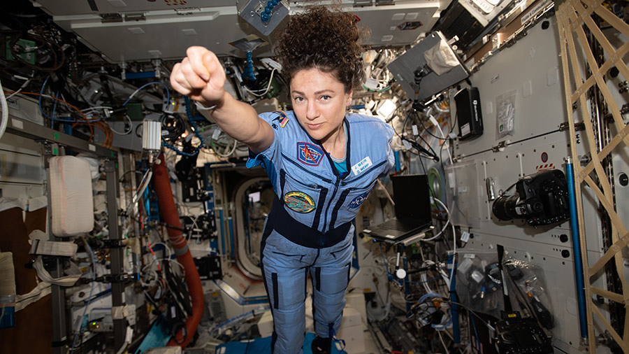 NASA astronaut Jessica Meir strikes a superhero pose