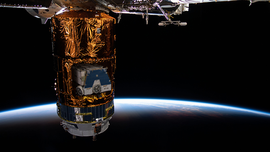 Japan's HTV-9 resupply ship is seen with the HTV-8 pallet inside containing old nickel-hydrogen batteries removed during a series of spacewalks earlier this year.