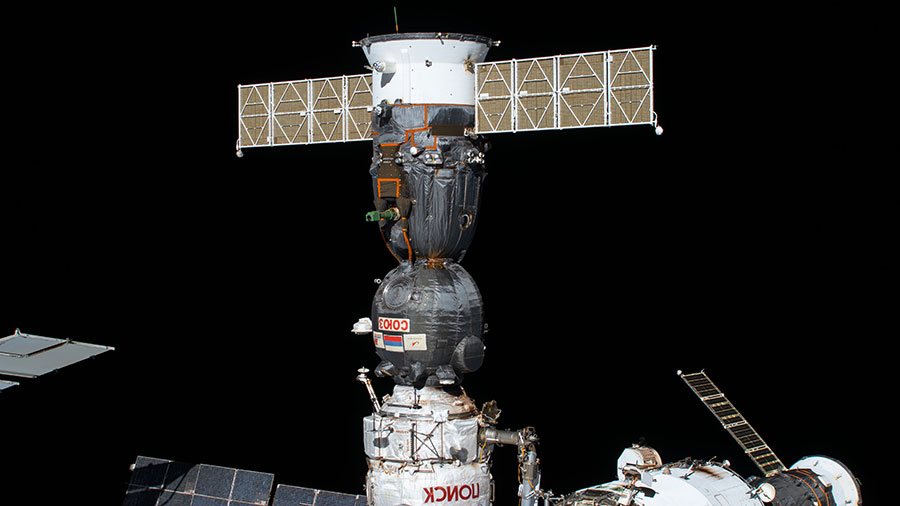 The Soyuz MS-16 crew ship is pictured docked to the International Space Station's Poisk module.