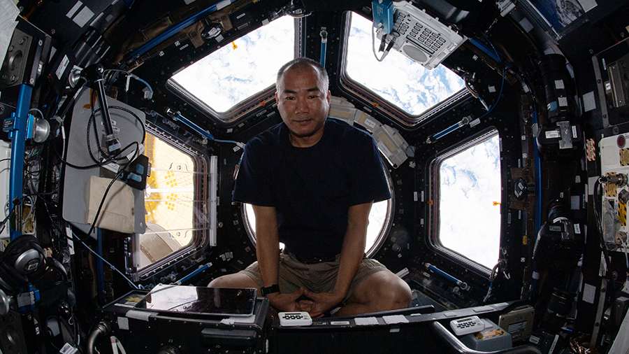 Expedition 64 Flight Engineer Soichi Noguchi is pictured relaxing at the end of the work day inside the seven-windowed cupola, the International Space Station's "window to the world."