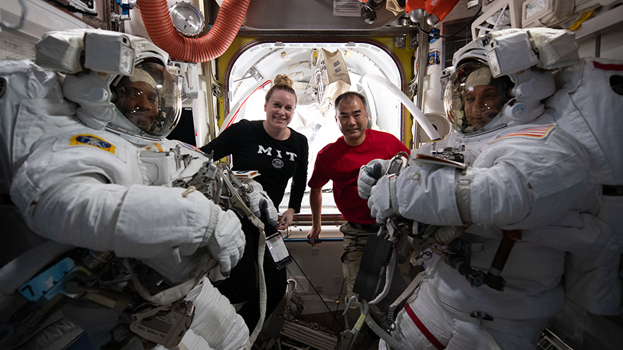 NASA spacewalkers (front left) Victor Glover and Michael Hopkins are pictured with (rear left) astronauts Kate Rubins and Soichi Noguchi before the start of spacewalk on  Jan. 27, 2021.