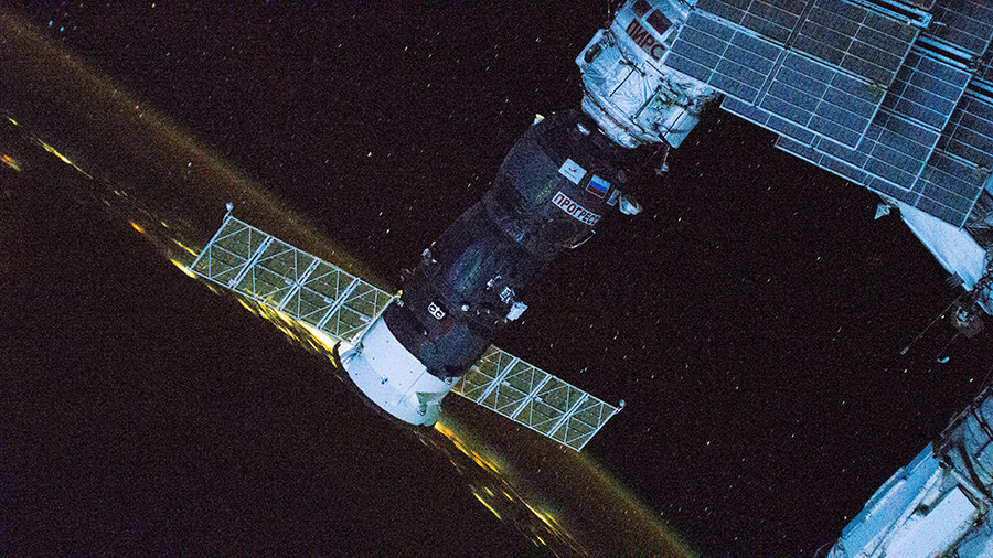 Russia's ISS Progress 77 cargo craft is pictured attached to the space station while orbiting 260 miles above the Gulf of Mexico.