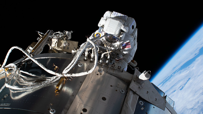 NASA astronaut and Expedition 64 Flight Engineer Michael Hopkins is pictured during a spacewalk on March 13, 2021, servicing communications gear on the outside of the International Space Station's Columbus laboratory module. Credits: NASA