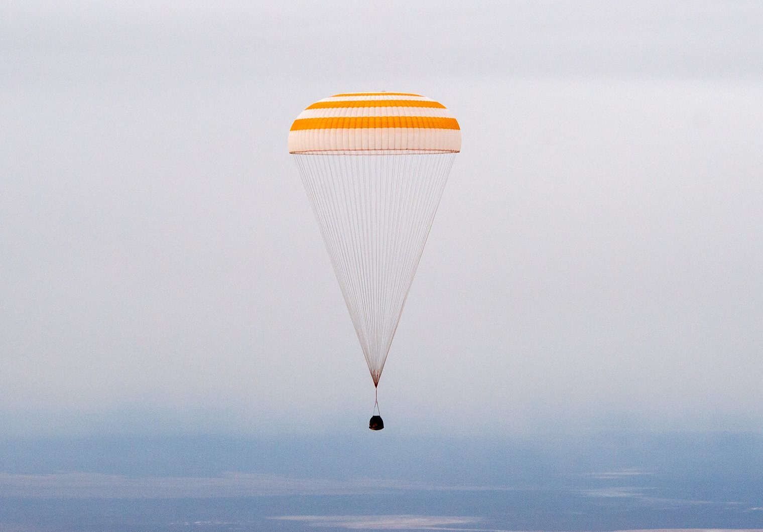 The Soyuz MS-16 spacecraft is seen as it lands in Kazakhstan with Expedition 63 crew.