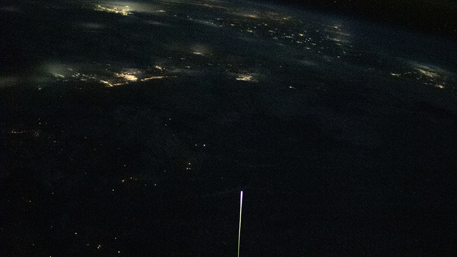 The SpaceX Crew Dragon Resilience, with four astronauts aboard, is pictured from the station reentering Earth's atmosphere on May 2, 2021.