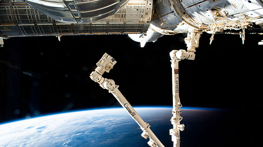 The forward portion of the space station, with the SpaceX Crew Dragon Endeavour at center top, is pictured as it orbited above the East China Sea.