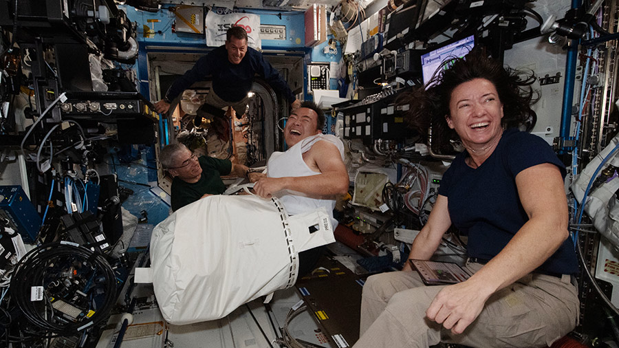 Expedition 65 astronauts (from right) Megan McArthur, Akihiko Hoshide, Shane Kimbrough and Mark Vande Hei share a light moment aboard the space station.