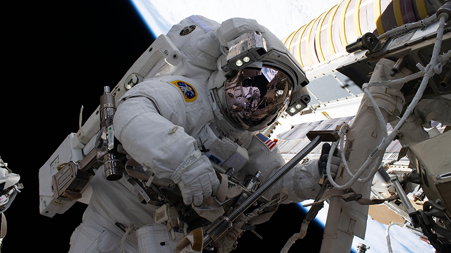 NASA spacewalker Shane Kimbrough is pictured during a spacewalk to install new roll out solar arrays on the International Space Station's Port-6 truss structure.