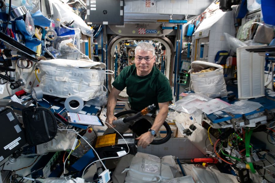 Expedition 65 Flight Engineer Mark Vande Hei is pictured inside the International Space Station’s Harmony module working on maintenance activities. 