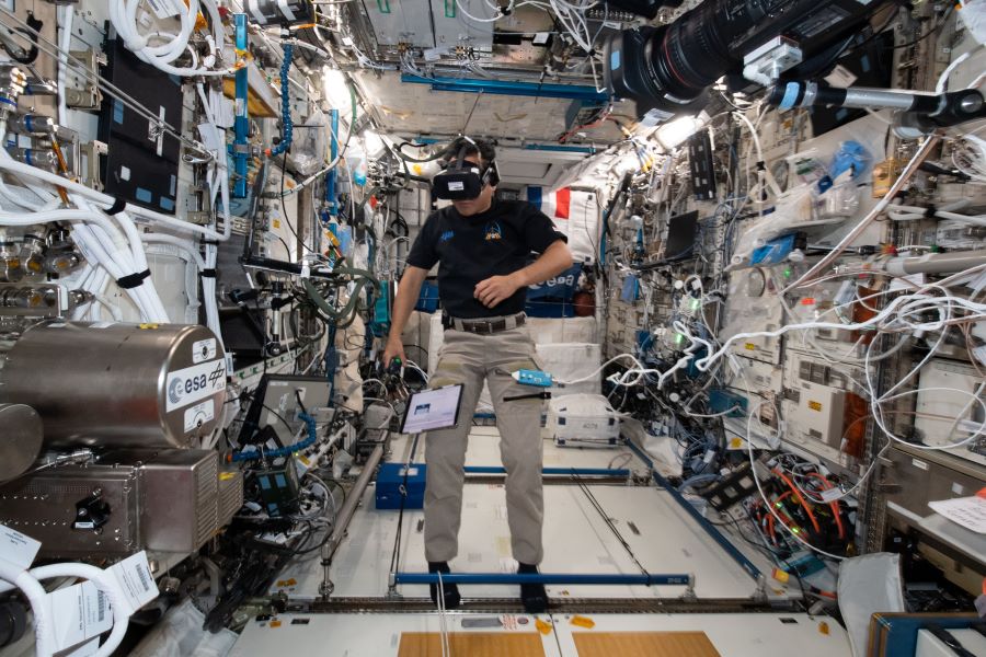 Expedition 65 Commander Akihiko Hoshide, pictured inside the Columbus laboratory module, wears virtual reality goggles for a time perception study.