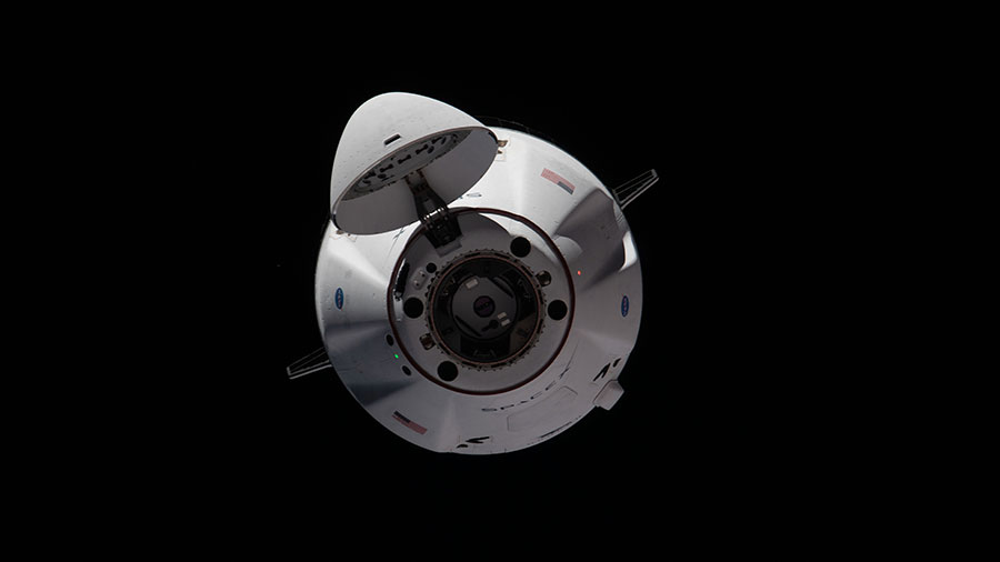 The SpaceX Cargo Dragon resupply ship is pictured approaching the space station on June 5, 2021.