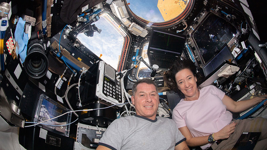 NASA astronauts Shane Kimbrough and Megan McArthur are pictured inside the cupola during the approach and rendezvous of the SpaceX Cargo Dragon on June 5, 2021.