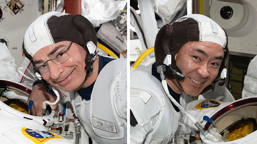 Astronauts Mark Vande Hei and Akihiko Hoshide check their U.S. spacesuits check to get ready for a spacewalk prepare the station for its third Roll-Out Solar Array.