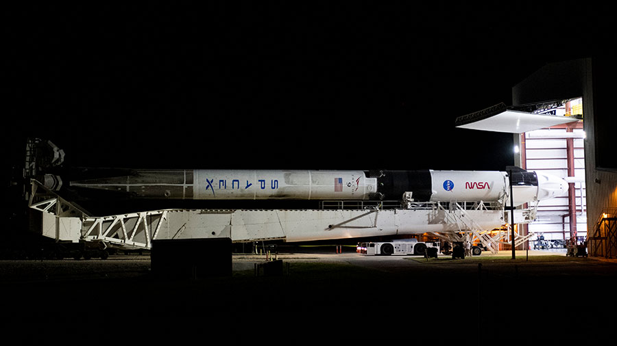 The SpaceX Falcon 9 rocket with the Crew Dragon Endeavour attached rolls out to the launch pad at Kennedy Space Center in Florida. Credit: NASA/Joel Kowsky