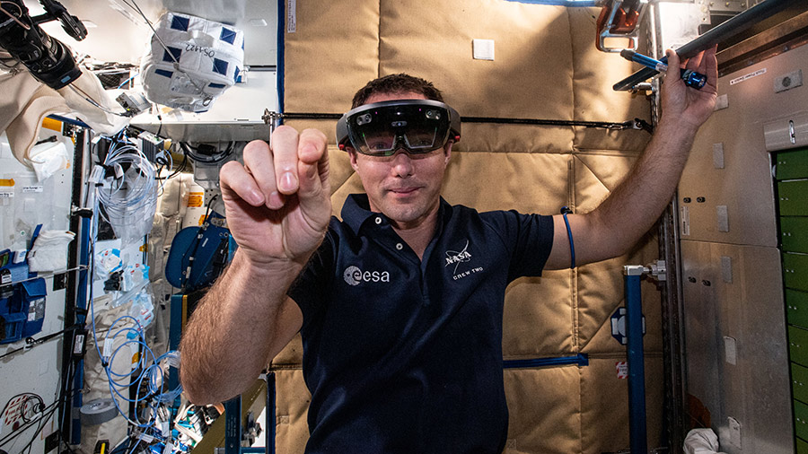 Astronaut Thomas Pesquet wears augmented reality goggles that assist crew members with science experiments and orbital maintenance tasks.