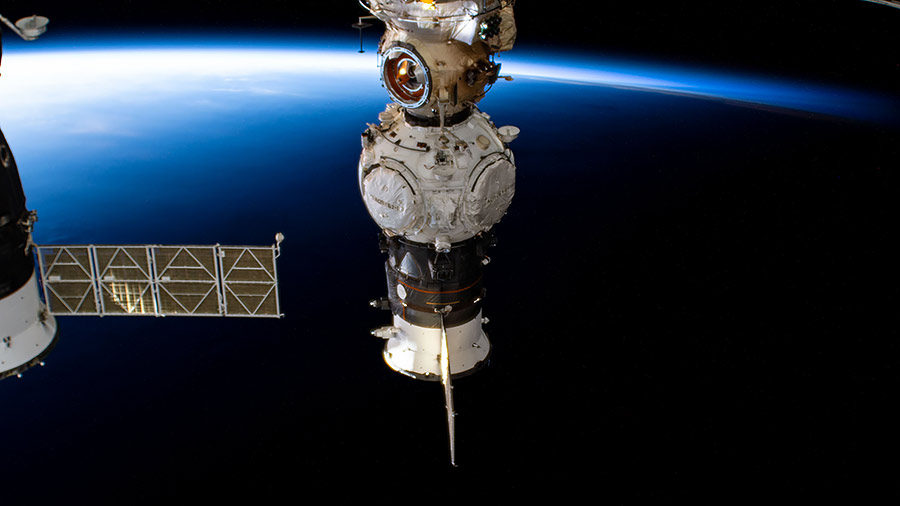 The Prichal, pictured still attached to the Progress delivery vehicle, is docked to the Nauka multipurpose laboratory module as the station orbited into a sunrise.