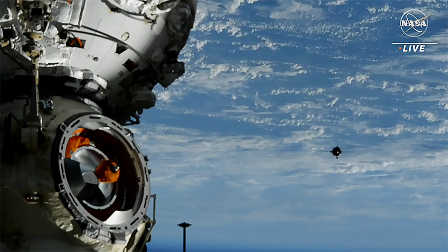 The Soyuz MS-21 crew ship with three cosmonauts aboard approaches the Prichal module for a docking in this view from the space station. Credit: NASA TV