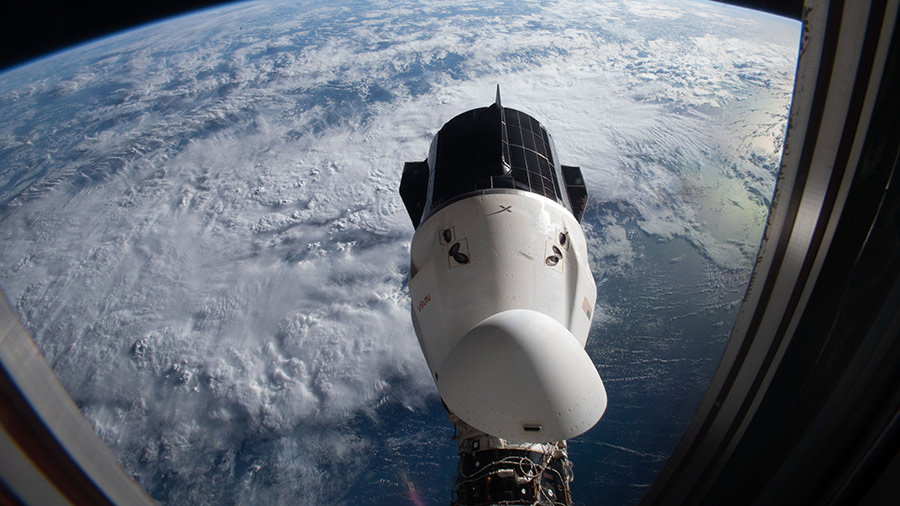 The SpaceX Dragon Endurance crew ship is pictured from a window aboard the SpaceX Dragon Endeavour crew ship.