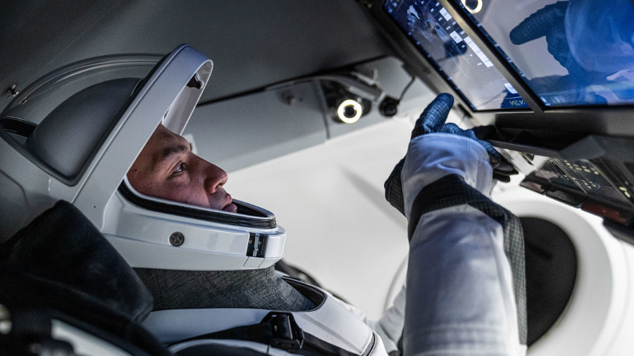 NASA astronaut and SpaceX Crew-4 Commander Kjell Lindgren, representing NASA's Commercial Crew Program, is pictured during a training session inside a mockup of the Crew Dragon vehicle at SpaceX Headquarters in Hawthorne, California on Feb. 15, 2022.