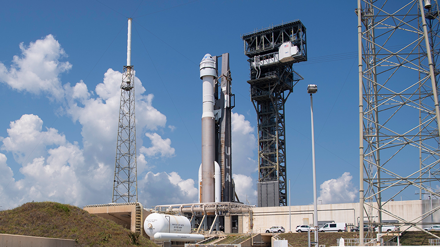 Boeing's Starliner spacecraft, atop the United Launch Alliance Atlas-V rocket, arrives at the Cape Canaveral Space Force Station launch pad in Florida. Credit: NASA/Joel Kowsky