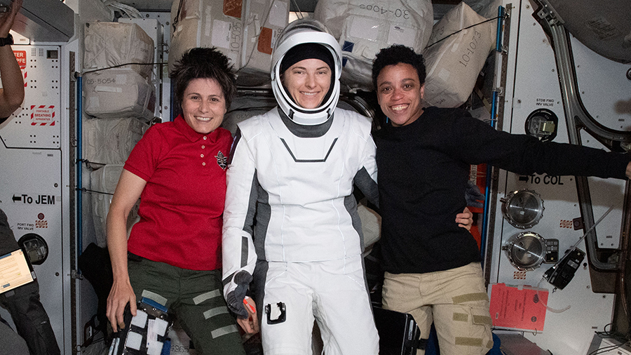 Astronaut Kayla Barron, posing with astronauts (from left) Samantha Cristoforetti, and Jessica Watkins, is pictured in her SpaceX flight suit before departing for Earth on May 5.