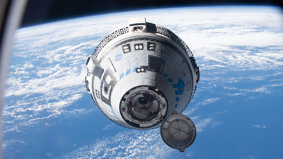 Boeing's CST-100 Starliner crew ship approaches the International Space Station above the south Pacific on May 20, 2022.