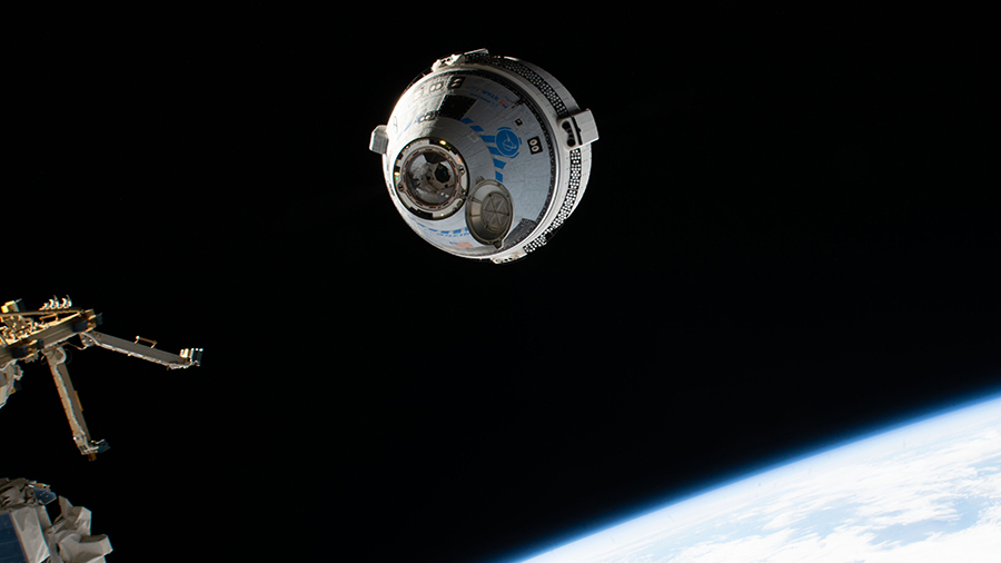 Boeing's Starliner crew ship approaches the space station during the company's uncrewed Orbital Flight Test-2 mission on May 20, 2022.