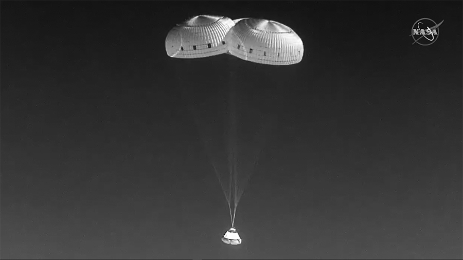 Boeing's #Starliner crew ship parachutes to a landing in New Mexico completing the company's Orbital Flight Test-2 mission. Credit: NASA TV