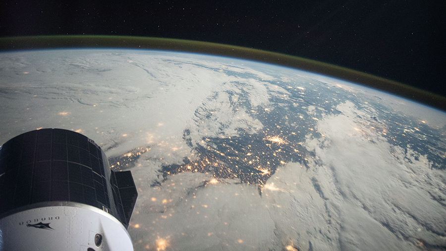 A portion of the SpaceX Cargo Dragon vehicle is pictured as the space station orbited above northern France in September of 2021. 