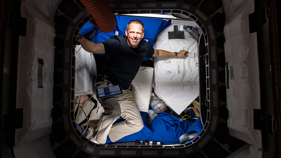 NASA astronaut and Expedition 67 Flight Engineer Bob Hines is pictured during cargo operations and inventory tasks inside the Cygnus space freighter from Northrop Grumman.