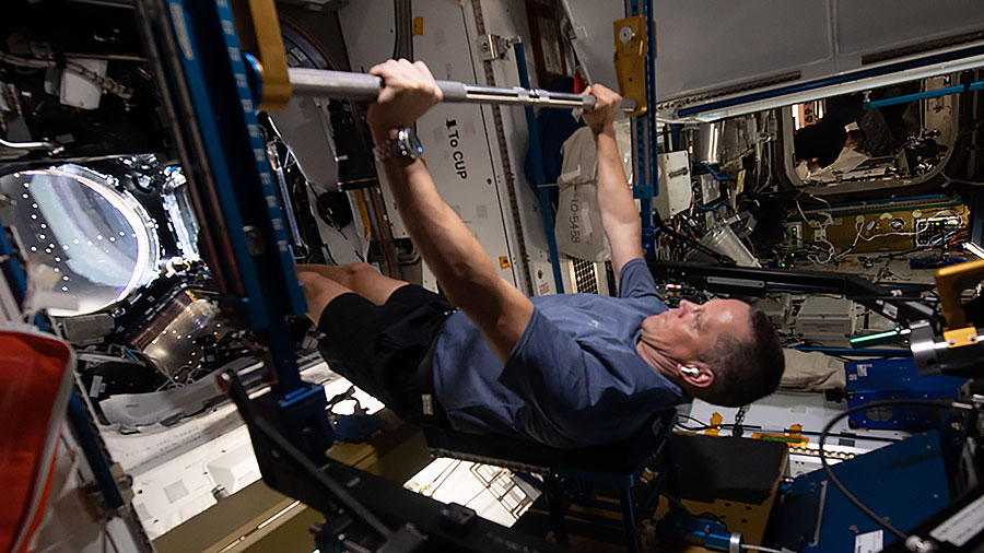 astronauts exercise in space